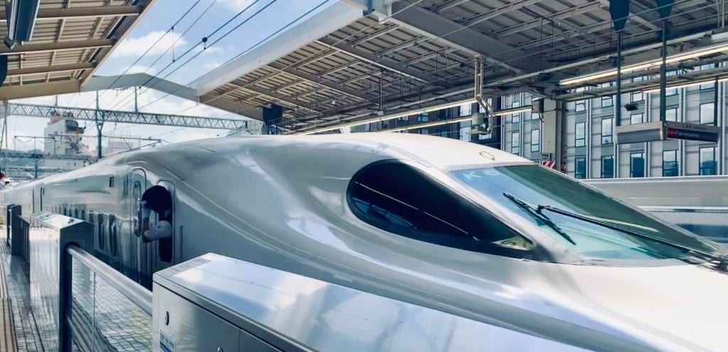 Nose of a shinkansen waiting at the platform.