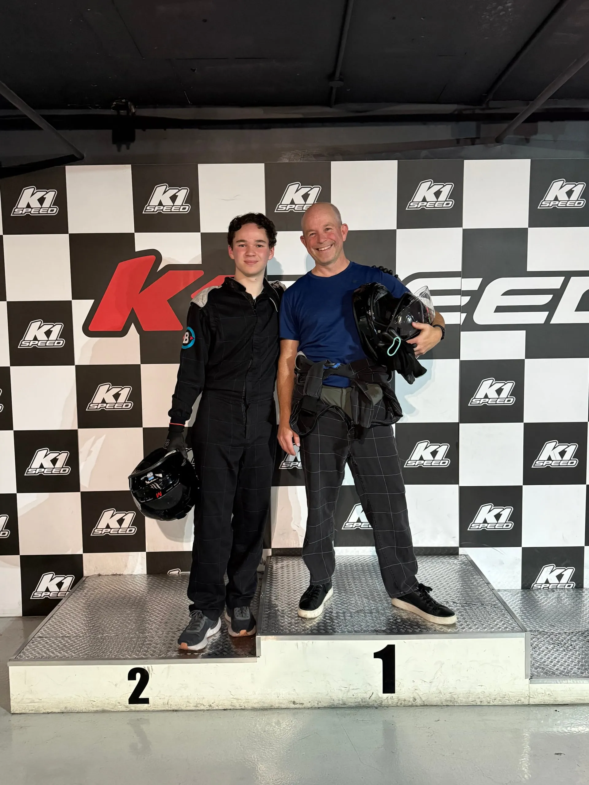 Kellan and his dad after a karting session.