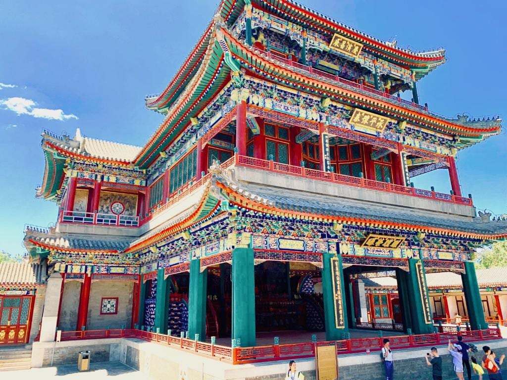 Ornate Chinese theater facade in red and green.